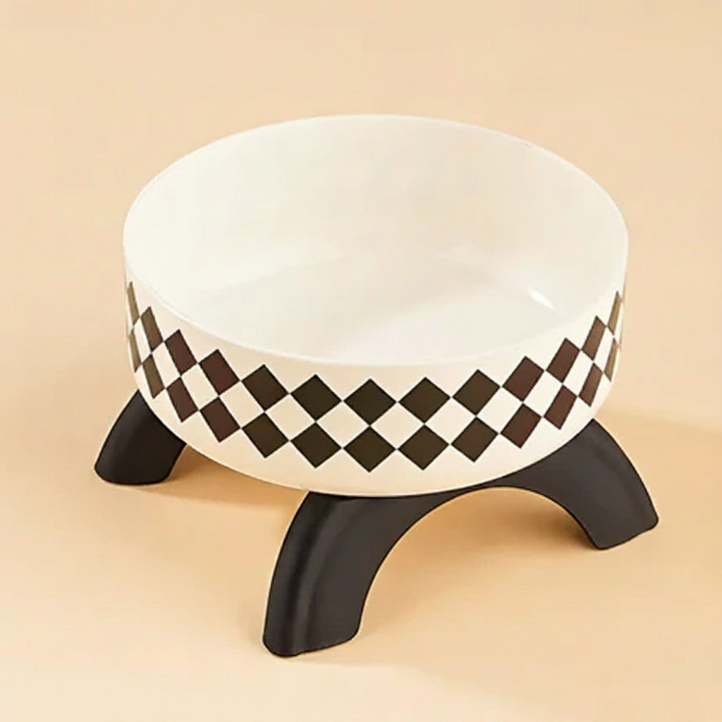 FurMidables elevated pet bowl with a white and black checkered pattern and a sturdy black four-legged stand.