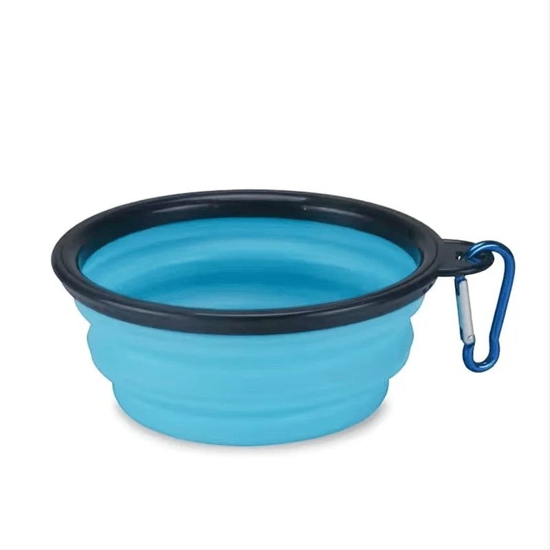 FurMidables collapsible blue silicone pet travel bowl with a black rim and attached carabiner clip.