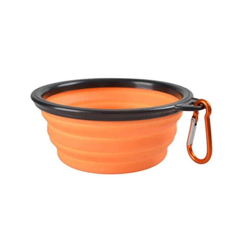 FurMidables collapsible orange silicone pet travel bowl with black rim and attached carabiner for hiking and trips