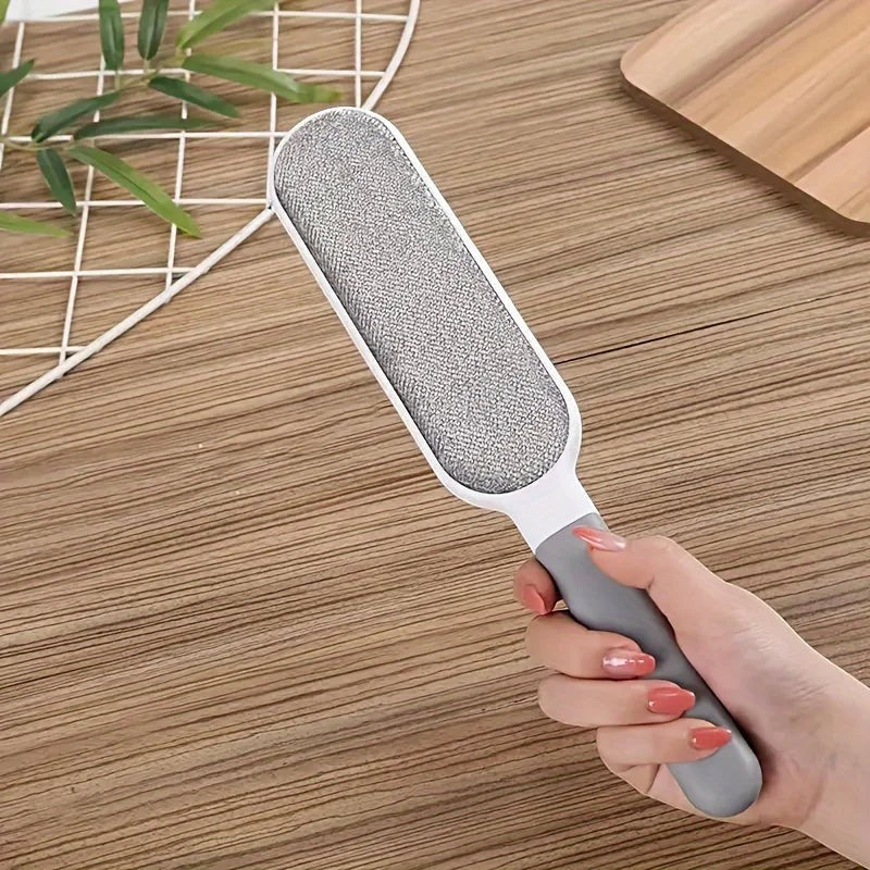FurMidables double-sided pet hair remover brush with a grey handle and electrostatic fabric for clothes and furniture
