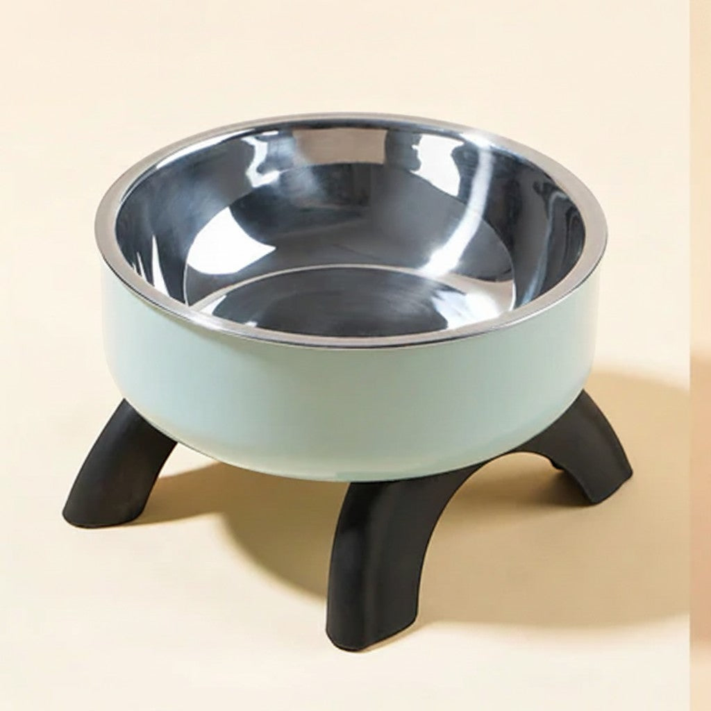 FurMidables elevated pet bowl with a mint green plastic base, black legs, and a removable stainless steel insert.