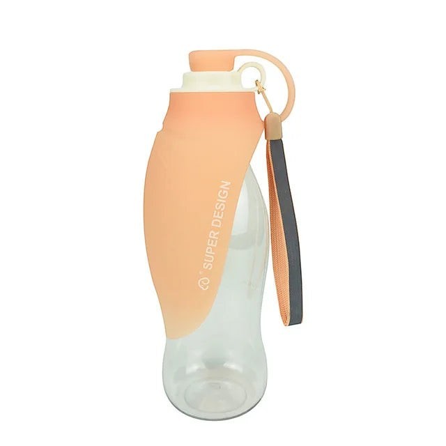 FurMidables 580ml portable orange silicone pet water bottle with a flip-up bowl for dogs and cats on the go.