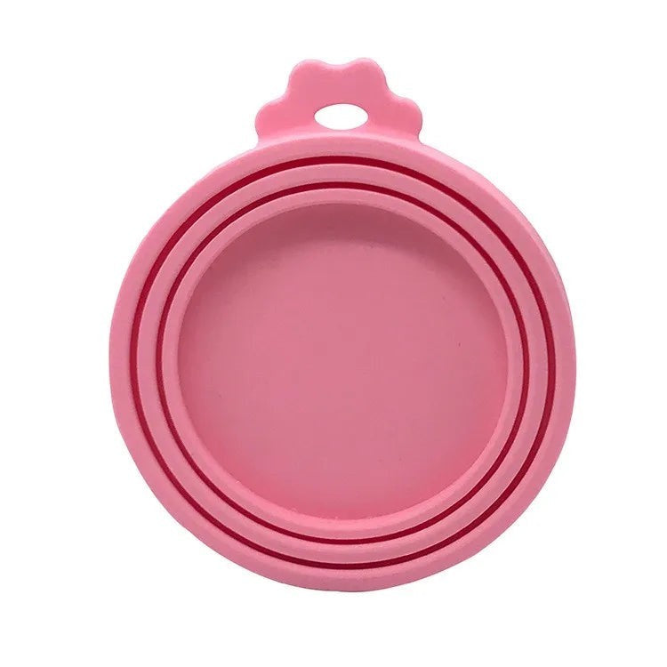 FurMidables pink BPA-free silicone pet food can lid with a universal airtight seal for dog and cat cans.