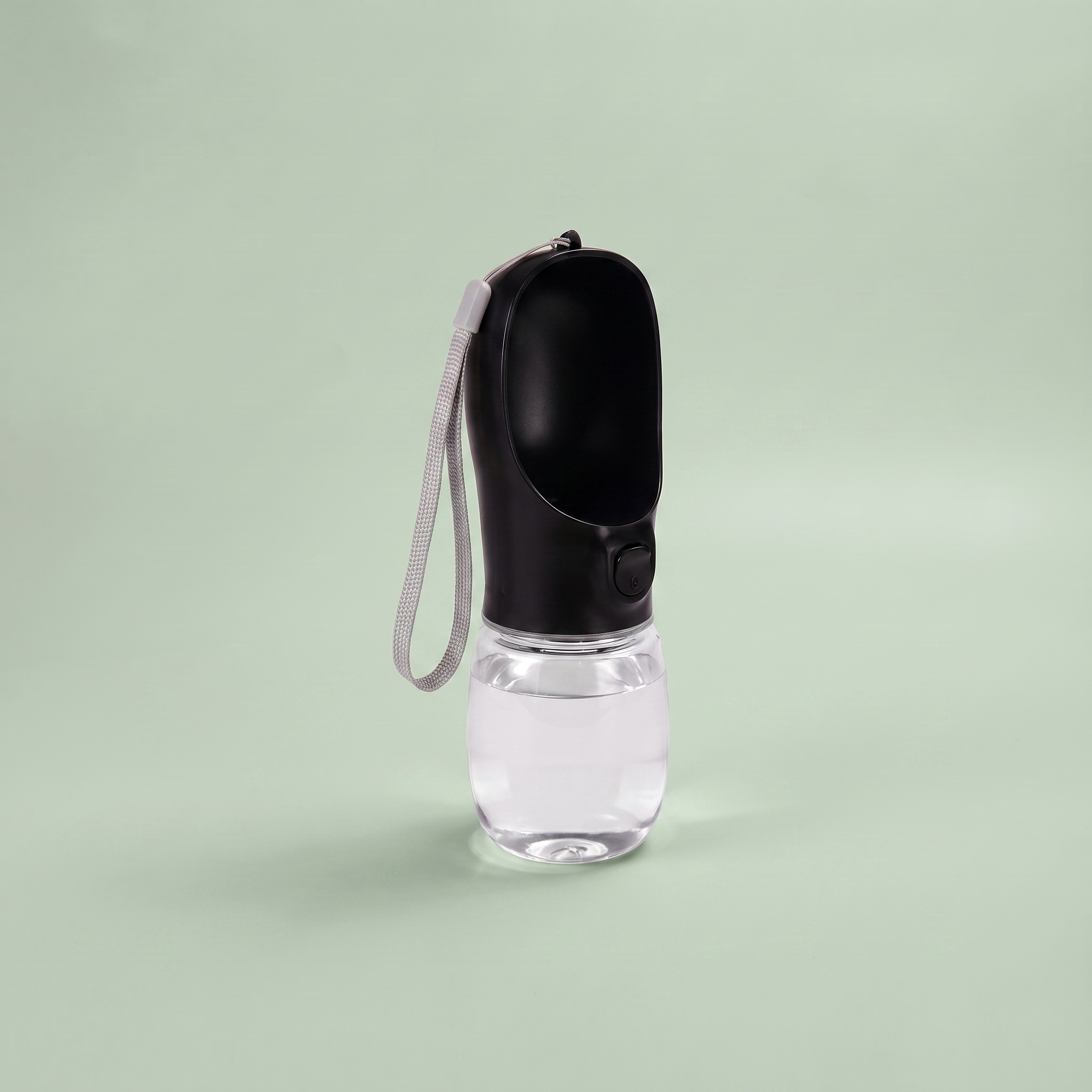 TrailSip 550ml portable dog water bottle in black, leak proof with slide lock