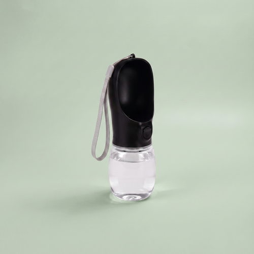 TrailSip 550ml portable dog water bottle in black, leak proof with slide lock